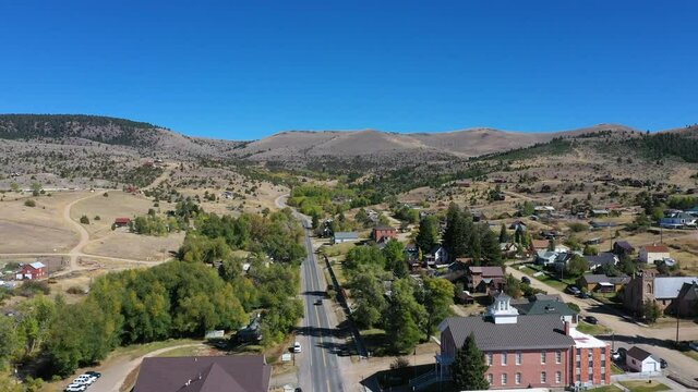 Aerial Virginia City Montana main street historic mining town 4K. Restored wild west mining town. Restored wild west mining town. Gold mine rush now an historic site and tourism center. Restoration.