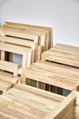 Stretcher bars, stack of wooden frames