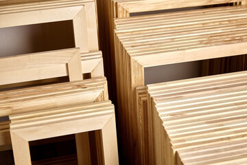 Fototapeta na wymiar Stretcher bars, stack of wooden frames for canvas wrap