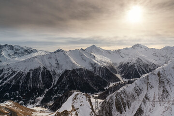 Panorama of alpine mountains in the morning at the Ischgl ski resort, Austria..