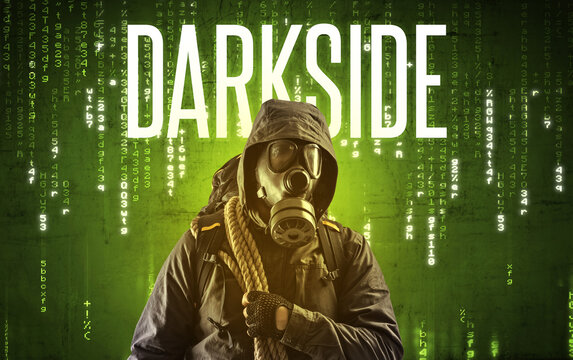 Faceless hacker with DARKSIDE inscription, hacking concept