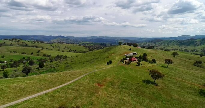 Agriculture farm near Sofala on hill ranges with green pastures as 4k.
