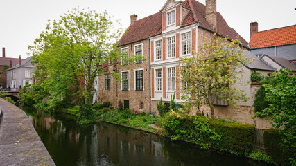 Beautiful View Of Authentic Houses Above The Canal In The Belgian City Of Bruges.