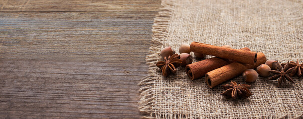 Cinnamon, anise and nuts ingredients for nailing a cupcake or Christmas mulled wine with a place to text.
