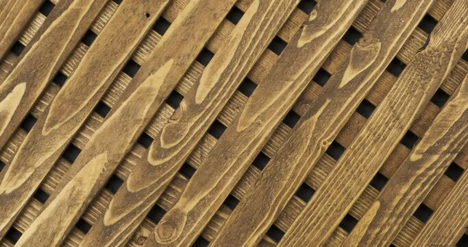 Texture of the wooden lattice. Natural wooden diagonal lattice.Top view. Beautiful, natural wood texture.