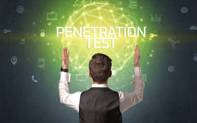Rear view of a businessman with PENETRATION TEST inscription, online security concept