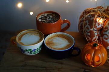 pottery mugs and pumpkins