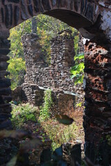 Close-up: An old window to the former precious inside of the ruin