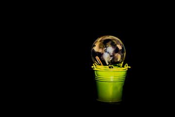 light bulb on a black background