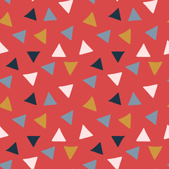 Vector seamless hand drawn geometrical pattern with colourful triangles on red background perfect for Christmas wrapping paper or other design