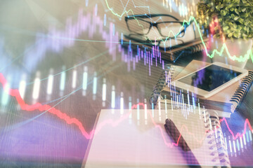 Obraz premium Double exposure of forex chart drawing and cell phone background. Concept of financial trading