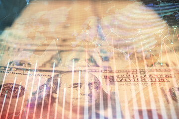 Double exposure of forex graph drawing over us dollars bill background. Concept of financial markets.