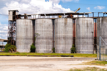 Tampa, USA Florida town with building exterior silos old industrial oil tanks for gas terminal