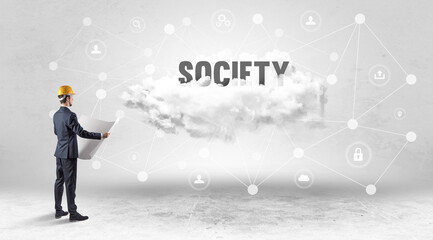 Engineer working on a social media concept with SOCIETY inscription