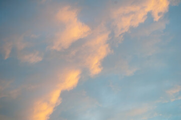 Naklejka na ściany i meble sunset clouds with sun setting down. abstract background. photo