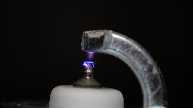 Macro view of working new Iridium spark plug