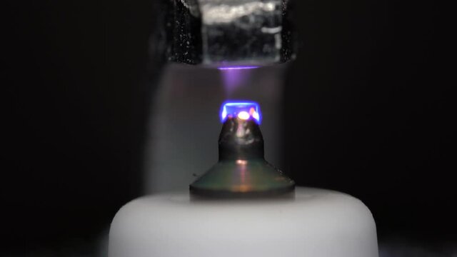 Macro view of working new Iridium spark plug