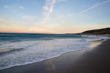 Landscape view of the sunset from Santa Rosa Island looking out at Santa Cruz Island in Channel Islands National Park (California).