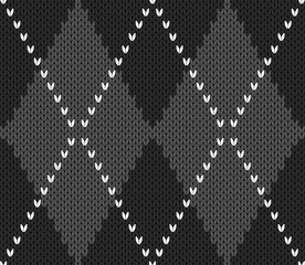 Knitted argyle Halloween pattern. Wool knitinng. Scottish plaid in gray and black rhombuses. Traditional  Scottish background of diamonds . Seamless fabric texture. Vector illustration