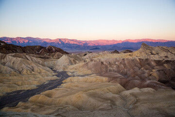 Fototapeta na wymiar Beautiful landscape of the morning light at Zabriskie Point in Death Valley National Park (California).
