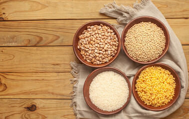 assortment grains beans lentils rise pasta rustic background