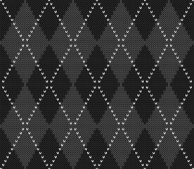 Knitted argyle Halloween pattern. Wool knitinng. Scottish plaid in gray and black rhombuses. Traditional  Scottish background of diamonds . Seamless fabric texture. Vector illustration