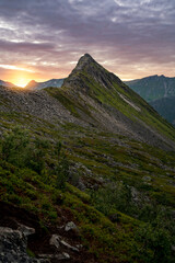 Sunset over Senja island in Northern Norway , mount Hesten in the middle of frame. (high ISO image)