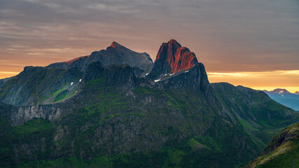 Fototapeta premium Sunset over Senja island in Northern Norway , mount Hesten in the middle of frame. (high ISO image)