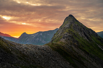 Sunset over Senja island in Northern Norway , mount Hesten in the middle of frame. (high ISO image)