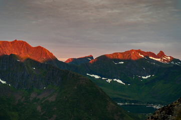 Sunset over Senja island in Northern Norway , mount Hesten in the middle of frame. (high ISO image)