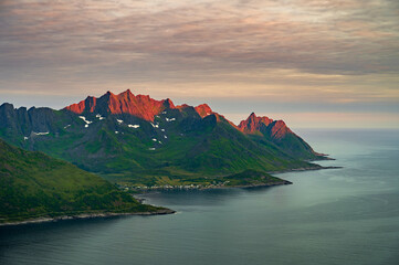 Sunset over Senja island in Northern Norway , mount Hesten in the middle of frame. (high ISO image)