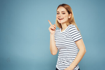 Pretty woman striped t-shirt fun emotions lifestyle blue background