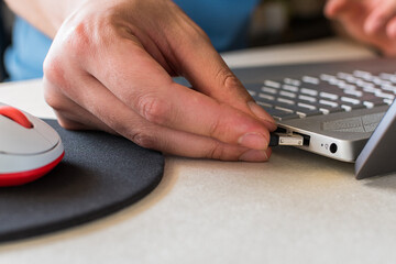 USB wireless adapter and laptop.