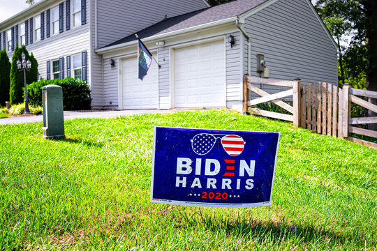 Sterling, USA - September 15, 2020: Closeup Of Presidential Election Political Yard Lawn Sign Poster For Joe Biden Harris 2020 In Northern Virginia Suburbs With Brick House Exterior