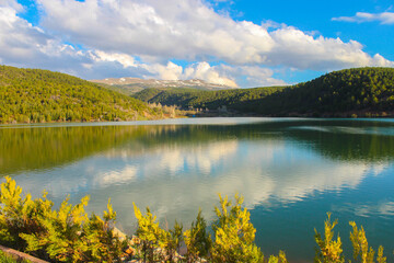 A beautiful and generic view of lake and mountains, lake and mountains with a reflection