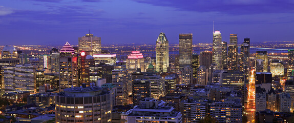 Aerial view of Montreal skyline in autumn illuminated at dusk, Quebec, Canada