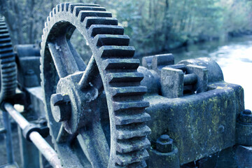 Old rusty gear from a weir