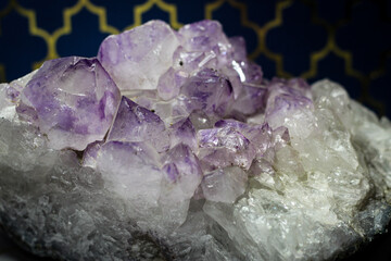 amethyst crystal with blue background