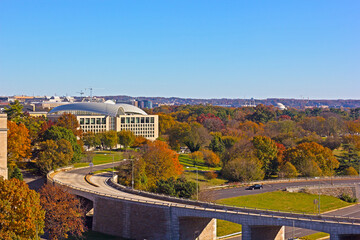 Washington DC panorama as seen from the Potomac River waterfront building in autumn. Park zone around US capital city downtown.