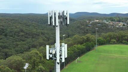 Aerial panorama footage of the main structure of a telecommunications tower