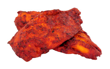 Chicken Tikka chicken breast thins marinated in mild spice blend isolated on a white background