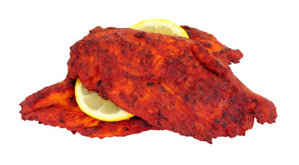 Chicken Tikka chicken breast thins marinated in mild spice blend isolated on a white background