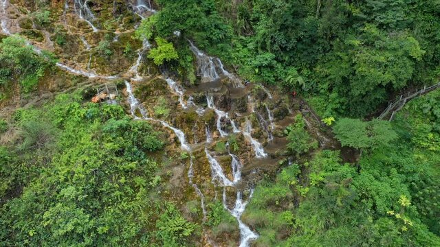 Drone aerial fottage of a waterfall on rocks