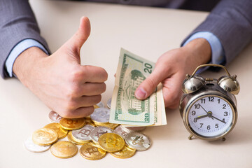 Young man earning money via Internet in time management concept