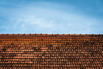 Blue sky on the red roof