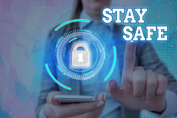 Text sign showing Stay Safe. Business photo text secure from threat of danger, harm or place to...