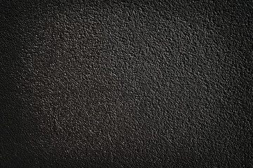 black wall with decorative plaster texture background