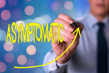 Text sign showing Asymptomatic. Business photo text a condition or an individual producing or...