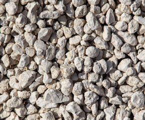 Stone gravel at a construction site as a background.