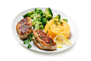 Grilled Chicken breast or fillet served with mashed sweet potato and stir fry broccoli. Healthy diet menu for lunch. isolated on white background